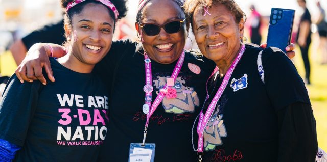 a group of women standing next to each other